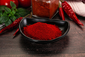 Spicy dry paprika powder in the bowl