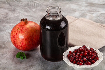 Sweet fresh pomegranate juice with fruit