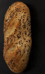 rustic multigrain bread on a wooden table
