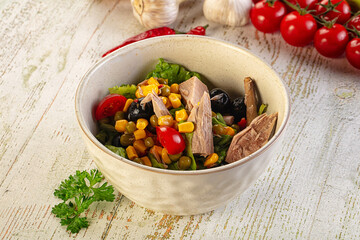 Dietary salad with canned tuna and corn