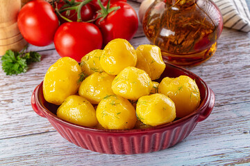 Boiled young potato with oil