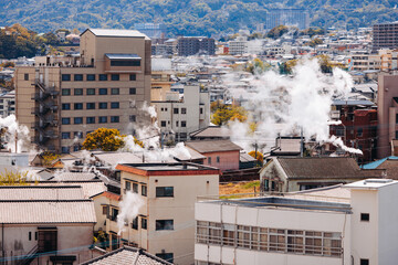 Beppu, Japan, city panorama skyline, Kannawa onsen distict, Oita prefecture, Kyushu island region,, Yukemuri observation deck, rising hot steam from onsen ryokan bath houses, Beppu resort hot springs