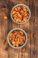 Almond oil with almond seeds.