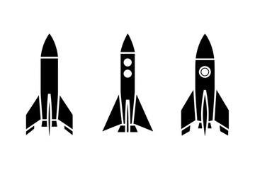 Three rocket ships black and white vector graphic
