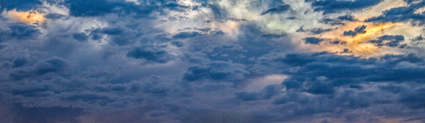 Obraz premium sunset storm clouds panorama