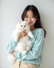 Portrait of a Passionate Animal Lover Holding Cat on White Background