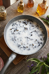 Homemade production of comfrey root ointment with rendered pork lard