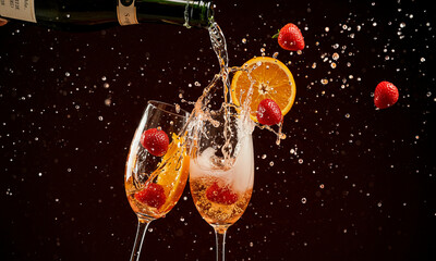 Sparkling Wine Splash with Fruits in Motion

