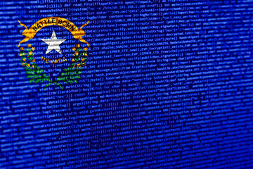Flag of Nevada over digital code. Concept of cybersecurity, innovation, and digital infrastructure...