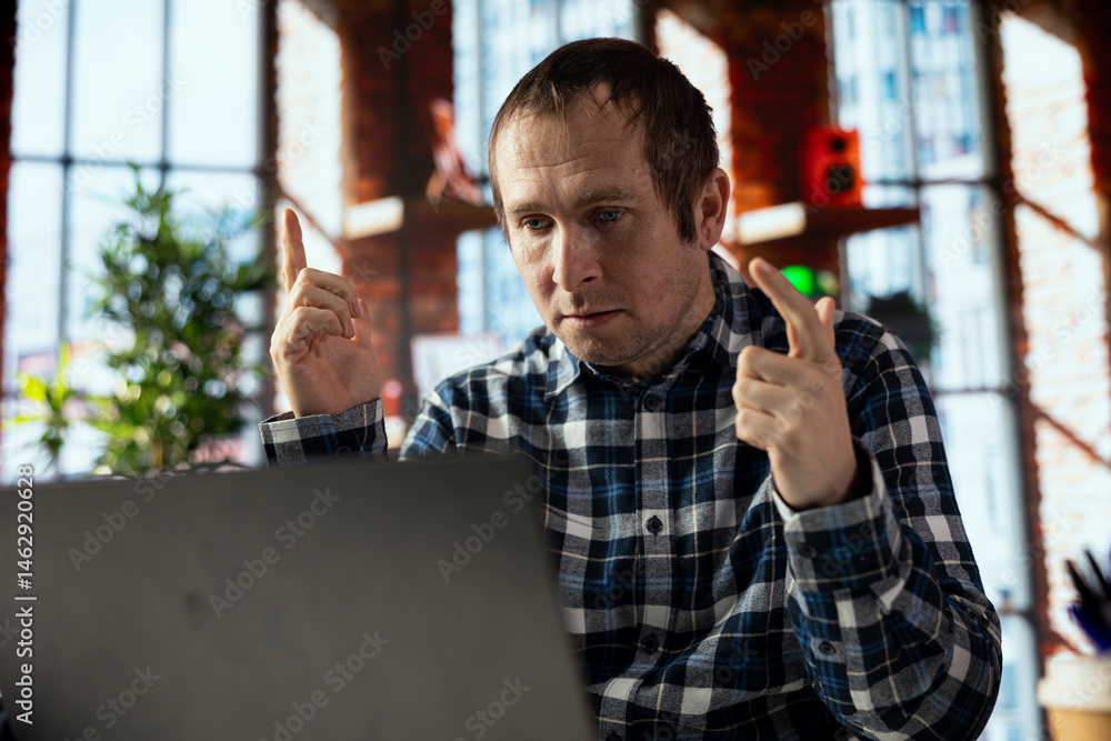 Poster teleworker in home office using laptop, preparing presentation slides, adjusting layouts. freelancer