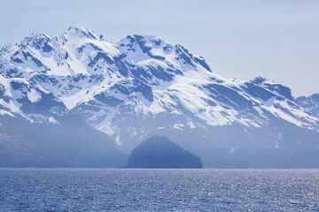 A haze lingers over the seas off the Kenai Peninsula, just off the Alaskan coast.