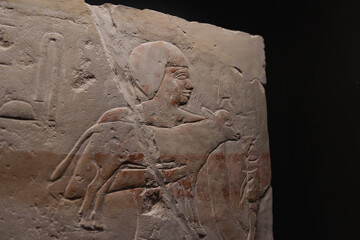 Egyptian hieroglyphs on display in a museum.