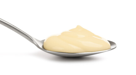 Tasty vanilla pudding in spoon isolated on white