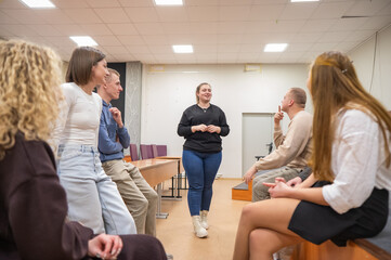 Students learn sign language at university. 