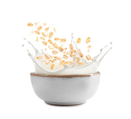 Oats and milk splashing out from bowl on white background