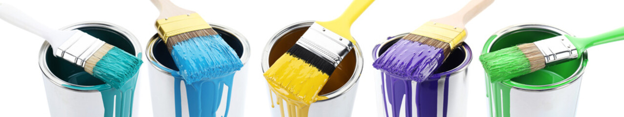 Cans with paint drips of different colors and brushes on white background, set
