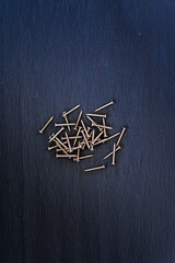 screws and tools on the black background, carpentry 