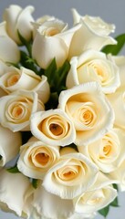 Obraz premium bouquet of white roses with green leaves
