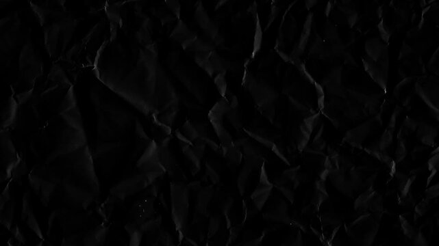 unfolding black crumpled paper animation 