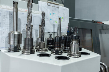 drills and milling cutters on a CNC machine