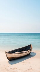 A small boat is sitting on the beach