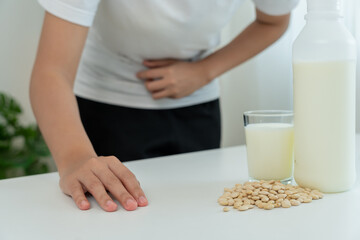 soy allergens, Sick sad unhealthy ill allergic woman, runny stuffy sore nose suffer from intolerance allergy trigger symptoms. abdominal pain, allergens, nut protein, rash, death, food allergy.