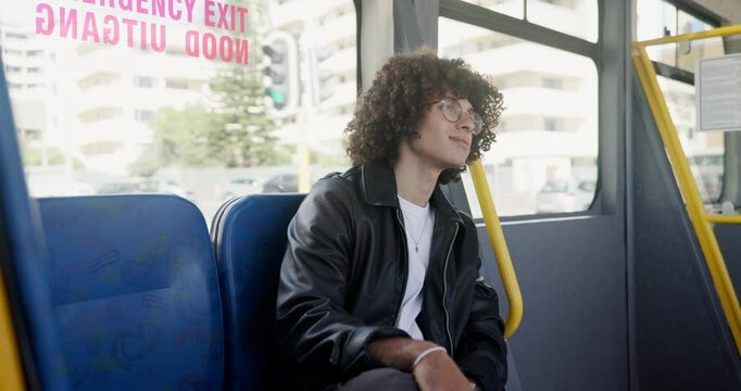 Thinking, travel and student or man on bus for reflection, college shuttle and journey. Public transportation, commute and person with memory on vehicle for morning drive, metro and tram services