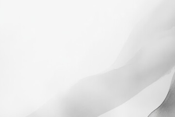 Abstract grayscale image of soft, flowing curves on a white background.  Gentle gradients create a sense of movement and depth