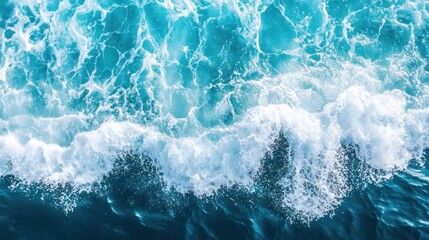 Fototapeta premium Ocean Wave Crashing Top View with Turquoise Water and White Foam
