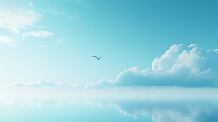 Fototapeta premium A bird flies over a calm blue ocean
