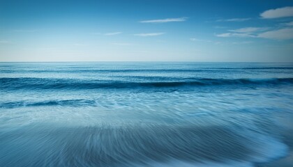Fototapeta premium the ocean is calm and the waves are small
