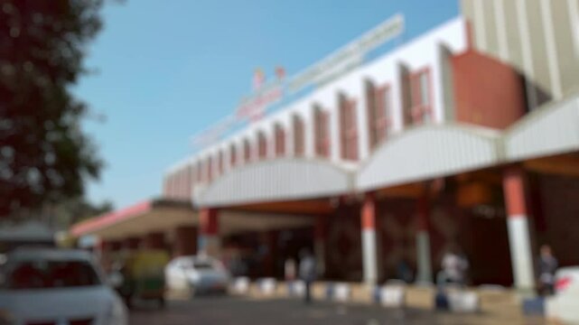 Bokeh view of KSR Bengaluru (Krantivira Sangolli Rayanna) railway station, Bangalore, India. Blurred background footage.