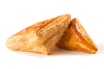 Puff pastry triangle isolated on white background.