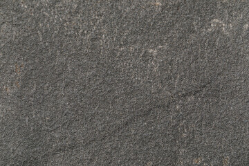 Grey concrete wall as background, closeup