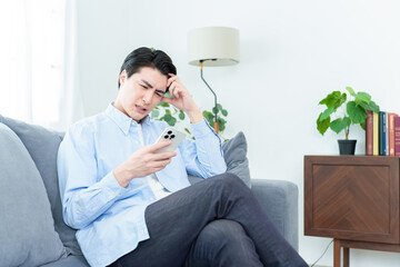 スマートフォンのトラブル　男性