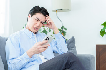 スマートフォンのトラブル　男性