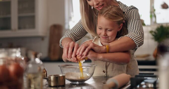 Home, learning and mother with girl, baking and bonding together with ingredients, help and support. Utensils, family or mama with daughter, recipe or time lapse with smile, kid or cooking in kitchen