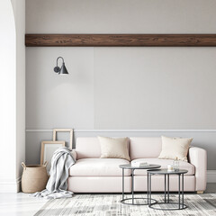 A comfortable living room features a light pink sofa and a small table with decorative items.