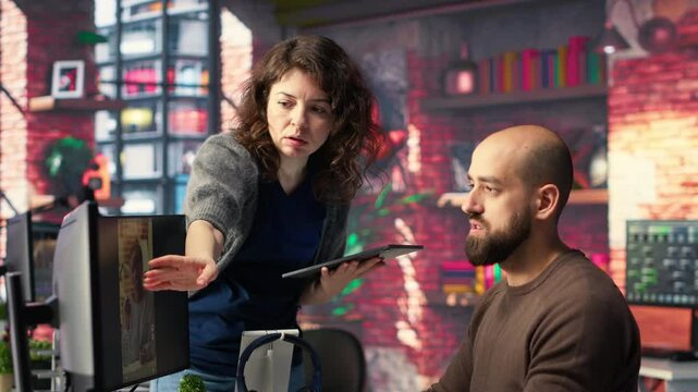 Professional editor uses AI powered software and PC reels in a creative office, marketing strategy used in targeting viral trends and boosting online followers and exposure. Camera B.