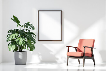A framed hangs on a white wall with a plant and chair.