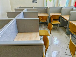 Empty Office Cubicles with Chairs for Study or Work