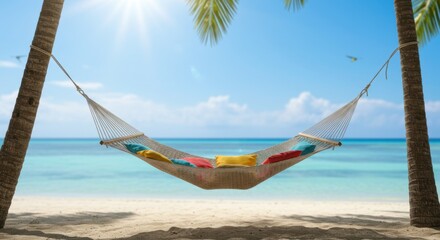 Woman relaxing in colorful hammock between palm trees on tropical beach. Summer vacation concept. Idyllic seaside getaway with turquoise water and blue sky. Space for text.