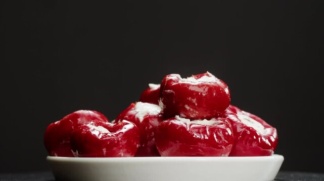 Stuffed pepper with cheese, Italian or Spanish restaurant with traditional tapas food, Spanish cuisine, delicious fermented salted tapas and cheese, dry tomatoes bar appetizer, buffet