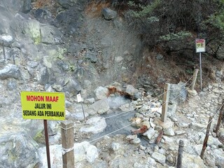 Hiking Trail with Steam Vents and Warning Sign, Rocky Landscape