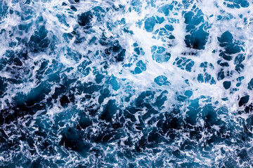 Ocean water surface texture. Aerial view of beautiful water with foam. Can be used in covers, packaging, posters, textures, wallpapers, art, and design projects. Amazing vector illustration.