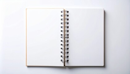 A blank notebook with spiral binding, resting on a white surface, inviting creativity and ideas