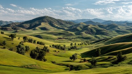 Obraz premium Rolling green hills under clear sky