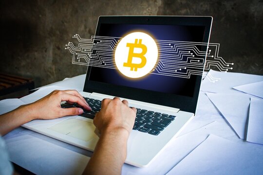 Bitcoin symbol on laptop with digital circuit lines. Ideal for crypto finance, digital money, blockchain illustration, fintech investment, and online transaction innovation visuals.