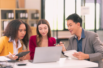A group of businessmen discussing investment and business growth, showing the results of successful teamwork.