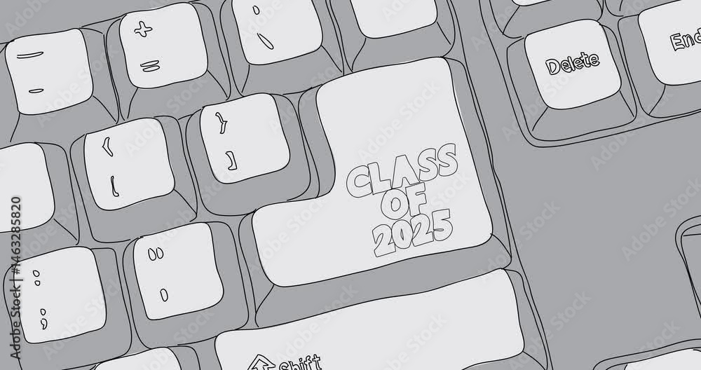 Poster writing the word class of 2025 on white computer keyboard. close-up of an electronic computer device